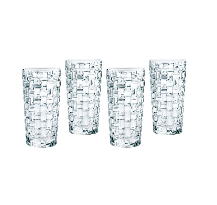A set of four clear glass lowball glasses with a geometric pattern.